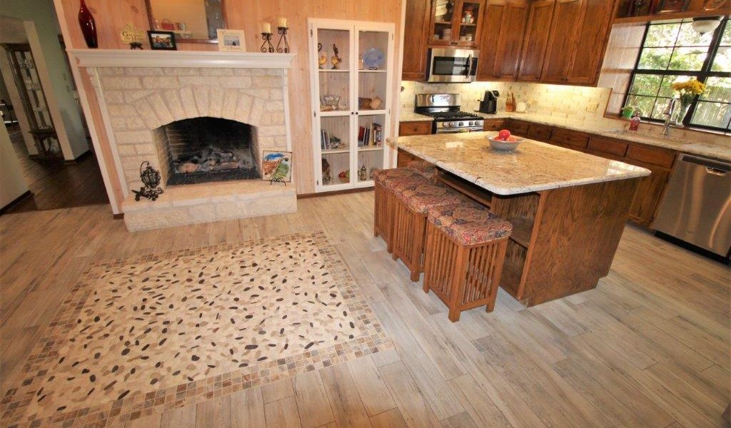 remodeled kitchen and fireplce